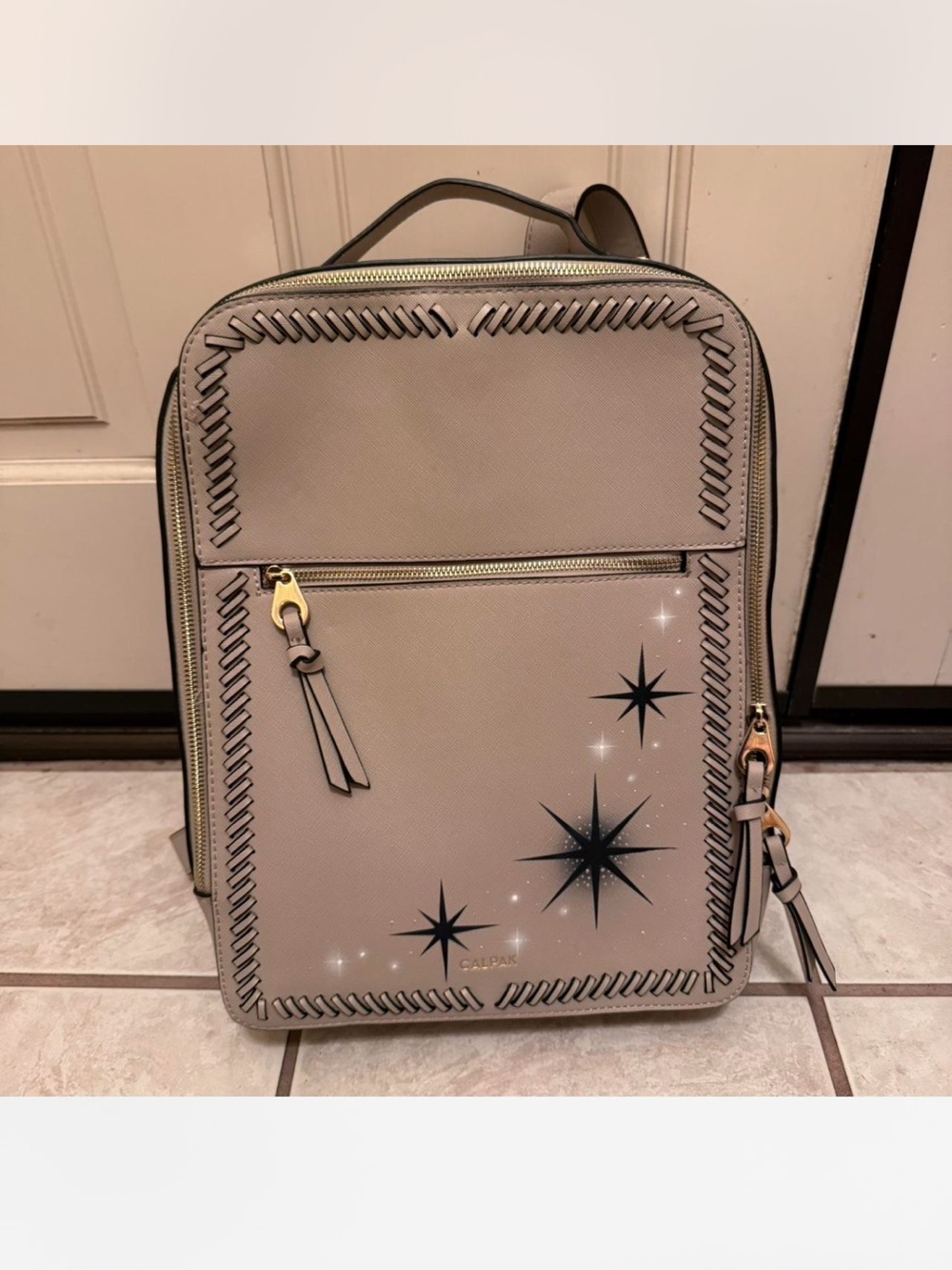 Calpak Light Taupe Faux Leather Backpack with Star Motif